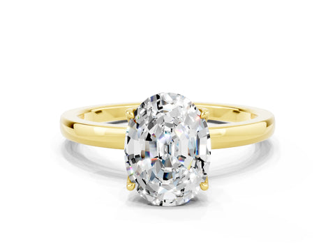 Yellow gold Oval Cut Solitaire Diamond Ring with Thin Band and Four-Prong Setting