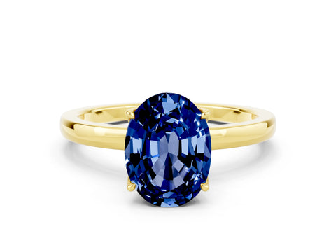 Yellow gold Oval Cut Solitaire Diamond Ring with Thin Band and Four-Prong Setting