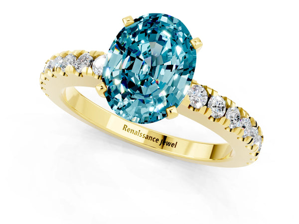 Yellow gold Oval Cut Solitaire Blue Topaz with Pavé Band and Four-Prong Setting