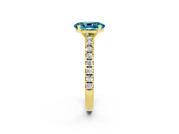Yellow gold Oval Cut Solitaire Blue Topaz with Pavé Band and Four-Prong Setting