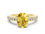 Yellow gold Oval Cut Solitaire Diamond with Pavé Band and Four-Prong Setting