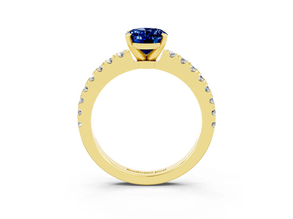 Yellow gold Oval Cut Solitaire Blue Sapphire with Pavé Band and Four-Prong Setting