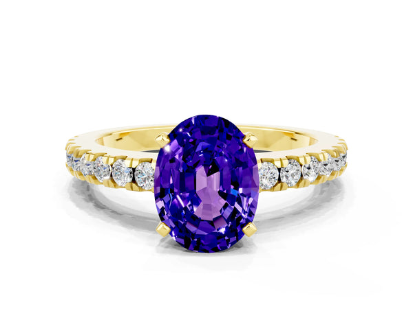 Yellow gold Oval Cut Solitaire Tanzanite with Pavé Band and Four-Prong Setting