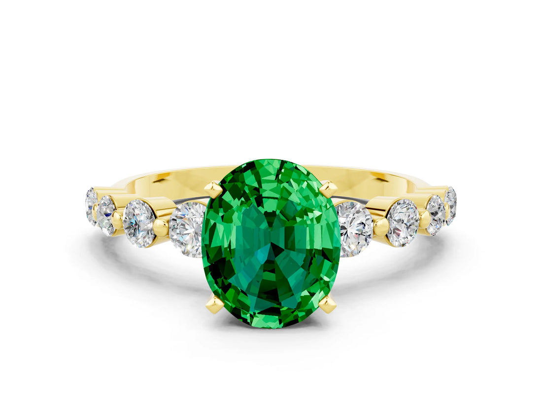 Yellow gold Oval Cut Solitaire Emerald Ring with Pave Band and Four-Prong Setting