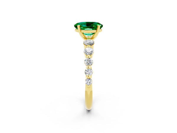 Yellow gold Oval Cut Solitaire Emerald Ring with Pave Band and Four-Prong Setting