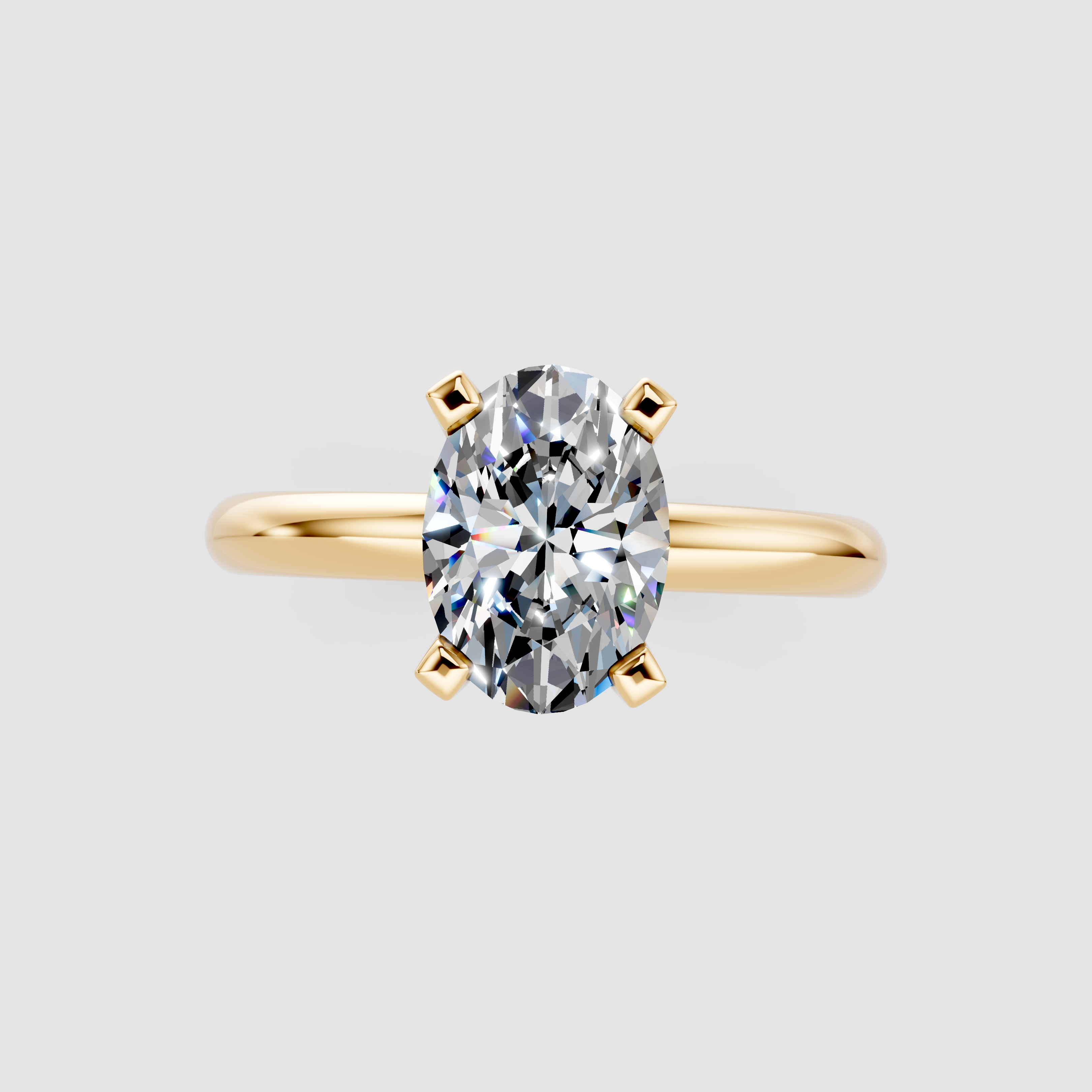 Yellow gold Oval Cut Solitaire Engagement Ring with Round Band and Four-Prong Setting 1