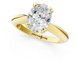Yellow gold Oval Cut Solitaire Engagement Ring with Tapered Band and Four-Prong Setting 1