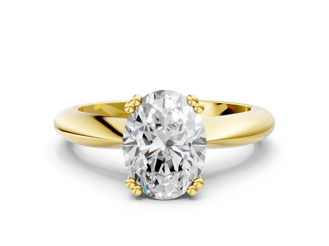 Yellow gold Oval Cut Solitaire Engagement Ring with Tapered Band and Four-Prong Setting