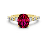 Yellow gold Oval Cut Solitaire Garnet Ring with Pave Band and Four-Prong Setting
