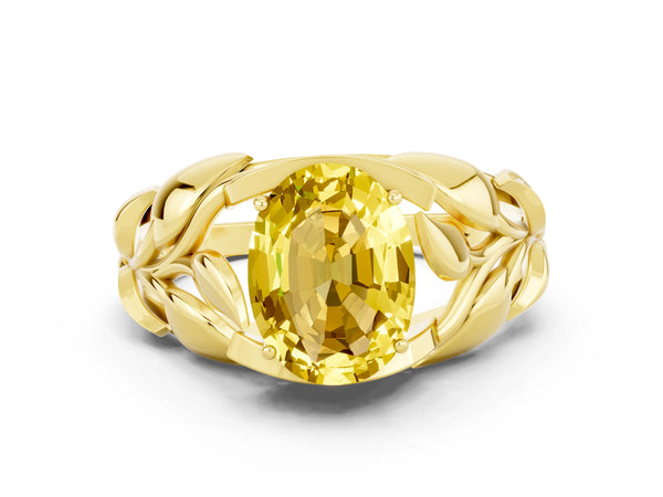 Yellow gold Oval Cut Yellow Sapphire Leaf-Inspired Engagement Ring with Round Accents and Prong Setting