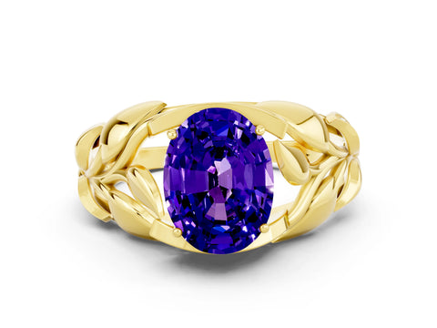 Yellow gold Oval Cut Solitaire Leaf-Inspired Engagement Ring with Prong Setting