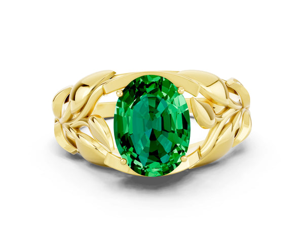 Yellow gold Oval Cut Emerald Leaf-Inspired Engagement Ring with Round Accents and Prong Setting