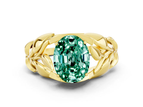 Yellow gold Oval Cut Solitaire Leaf-Inspired Engagement Ring with Prong Setting