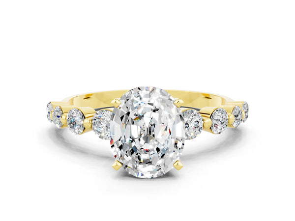 Yellow gold Oval Cut Solitaire Moissanite Ring with Pave Band and Four-Prong Setting