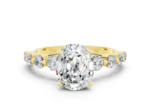 Yellow gold Oval Cut Solitaire Moissanite Ring with Pave Band and Four-Prong Setting
