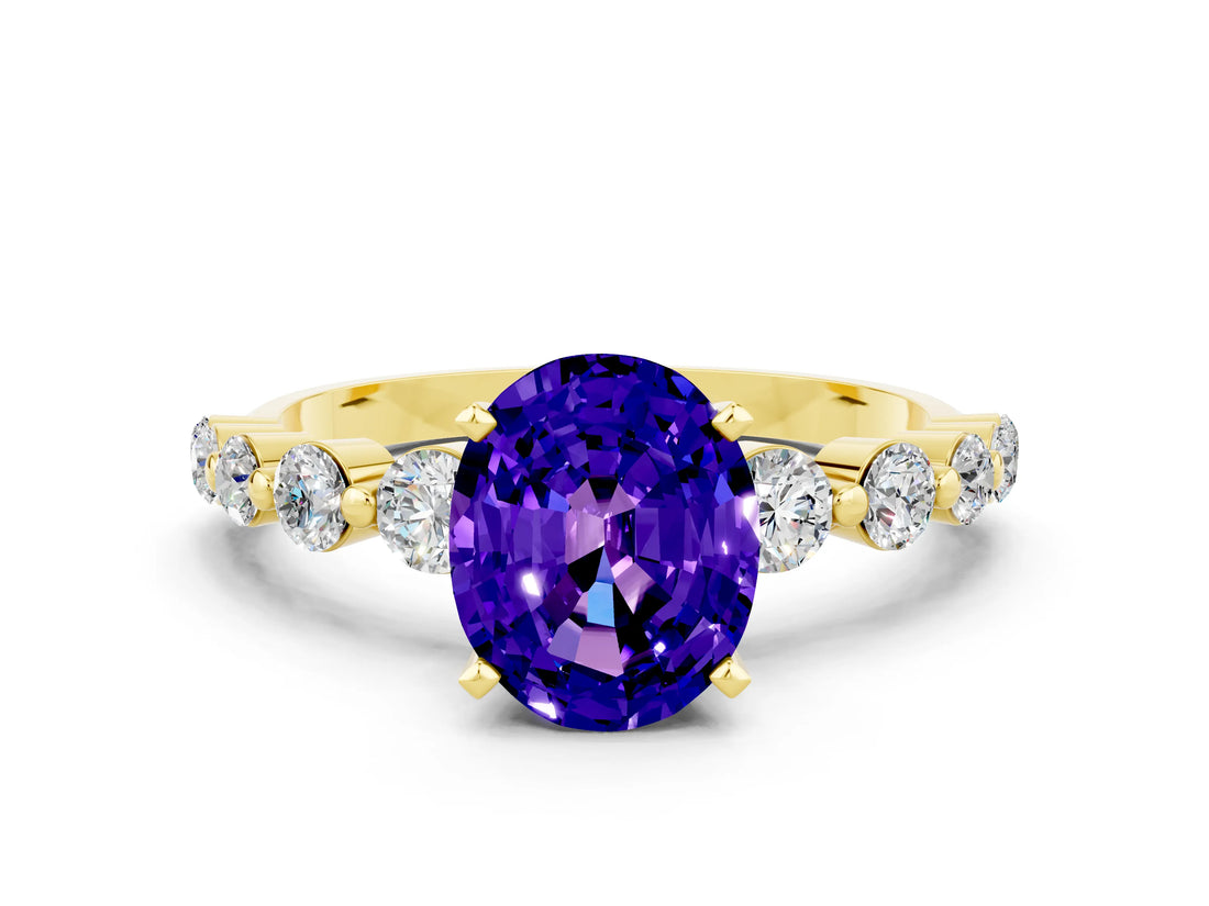 Yellow gold Oval Cut Solitaire Tanzanite Ring with Pave Band and Four-Prong Setting