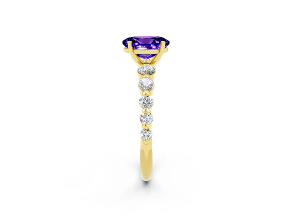 Yellow gold Oval Cut Solitaire Tanzanite Ring with Pave Band and Four-Prong Setting