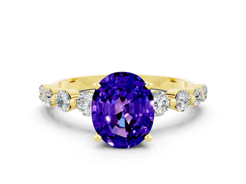 Yellow gold Oval Cut Solitaire Tanzanite Ring with Pave Band and Four-Prong Setting