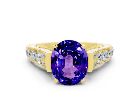 Yellow gold Oval Cut Tanzanite Classic Solitaire Ring with Pavé Band and Four-Prong Setting
