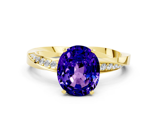 Yellow gold Oval Cut Tanzanite Engagement Ring with Side Stone Accents and Four-Prong Setting