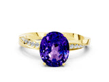 Yellow gold Oval Cut Tanzanite Engagement Ring with Side Stone Accents and Four-Prong Setting_60