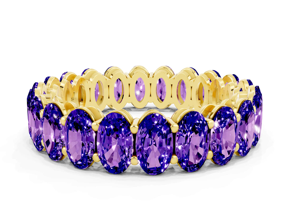 Yellow gold Oval Cut Tanzanite Eternity Band with Shared Prong Setting
