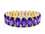 Yellow gold Oval Cut Tanzanite Eternity Band with Shared Prong Setting