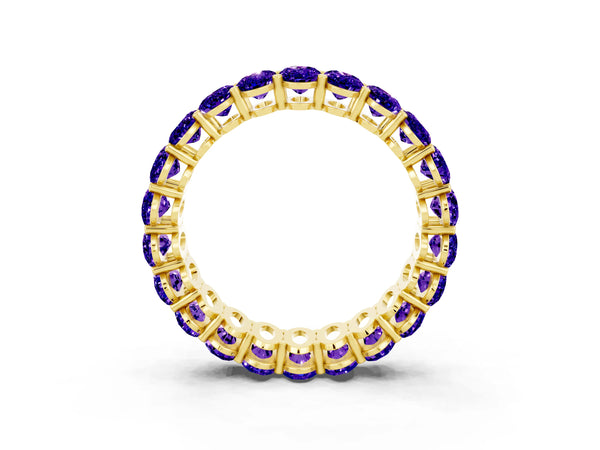 Yellow gold Oval Cut Tanzanite Eternity Band with Shared Prong Setting