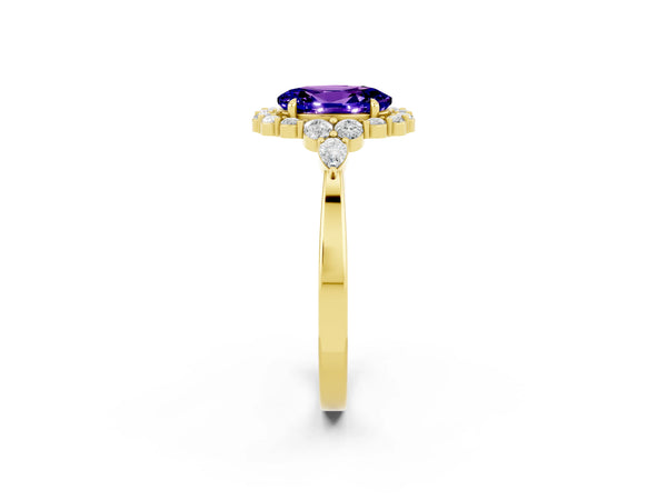 Yellow gold Oval Cut Tanzanite Halo Ring with Pear Side Stones and Prong Setting