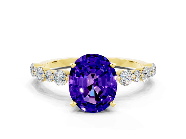 Yellow gold Oval Cut Tanzanite Prong Set Engagement Ring with Pavé Band