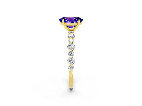 Yellow gold Oval Cut Tanzanite Prong Set Engagement Ring with Pavé Band