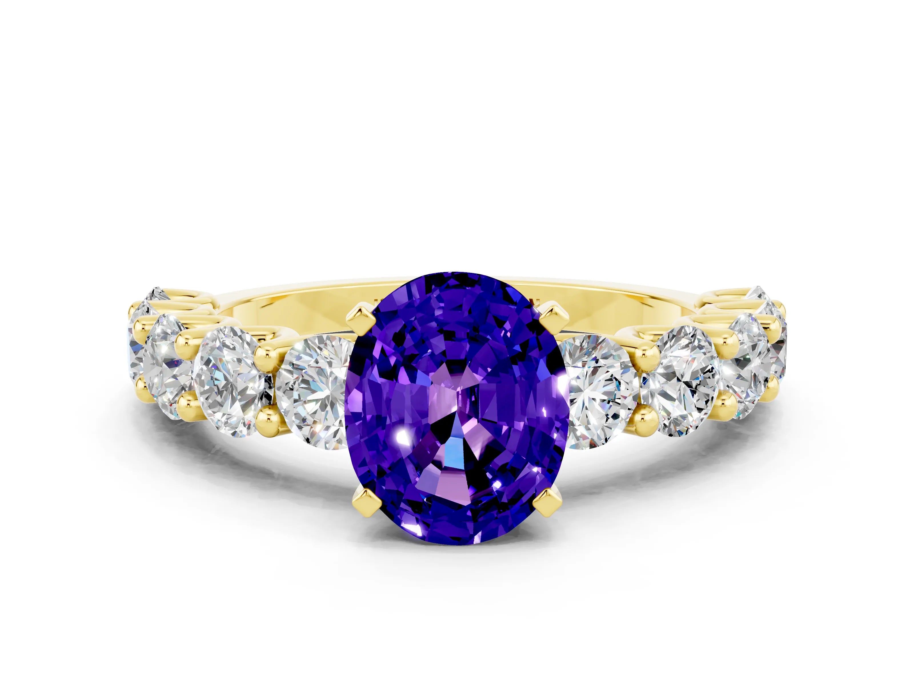 Yellow gold Oval Cut Tanzanite Prong Setting with Side Stones on a Pave Band