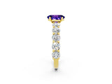Yellow gold Oval Cut Tanzanite Prong Setting with Side Stones on a Pave Band_2