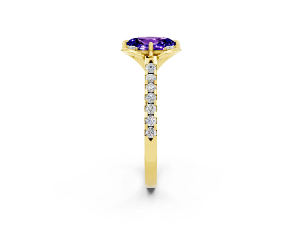 Yellow gold Oval Cut Tanzanite Ring with Pavé Band and Floral Prong Setting