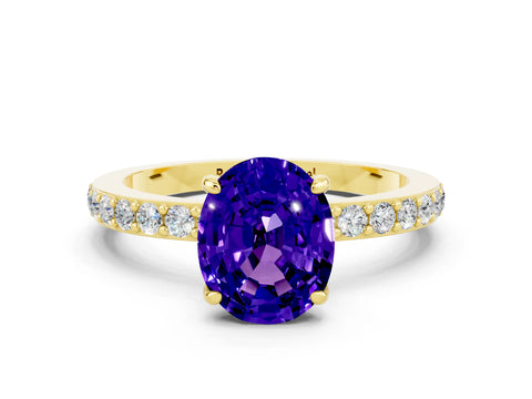 Yellow gold Oval Cut Tanzanite Ring with Pavé Band and Four-Prong Setting