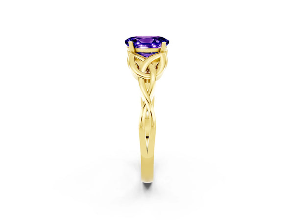 Yellow gold Oval Cut Tanzanite Solitaire Celtic Knot Ring with Four-Prong Setting