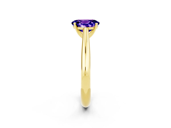Yellow gold Oval Cut Tanzanite Solitaire Engagement Ring with Cathedral Setting and Four-Prong Mount