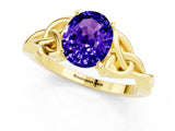 Yellow gold Oval Cut Tanzanite Solitaire Engagement Ring with Celtic Knot Band and Four-Prong Setting_1