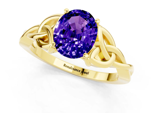 Yellow gold Oval Cut Tanzanite Solitaire Engagement Ring with Celtic Knot Band and Four-Prong Setting