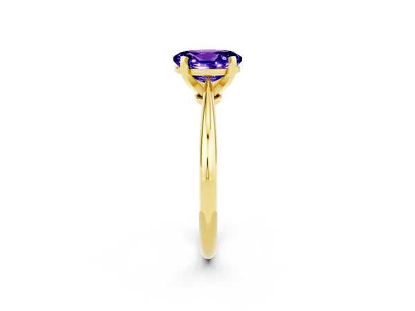 Yellow gold Oval Cut Tanzanite Solitaire Engagement Ring with Classic Band and Four-Prong Setting