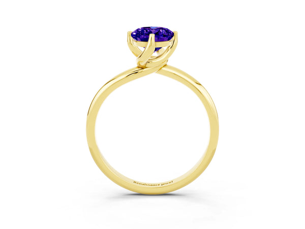 Yellow gold Oval Cut Tanzanite Solitaire Engagement Ring with Four-Prong Setting and Classic Band
