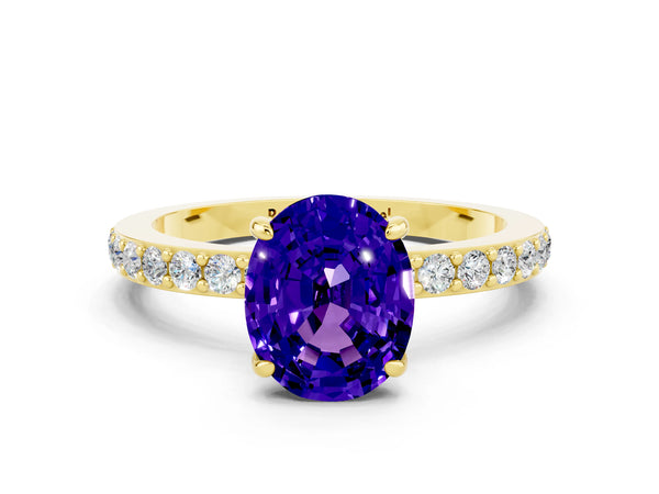 Yellow gold Oval Cut Tanzanite Solitaire Engagement Ring with Pavé Band and Four-Prong Setting