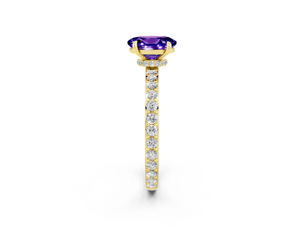 Yellow gold Oval Cut Tanzanite Solitaire Engagement Ring with Pavé Band and Four-Prong Setting