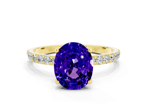 Yellow gold Oval Cut Tanzanite Solitaire Engagement Ring with Pavé Band and Prong Setting