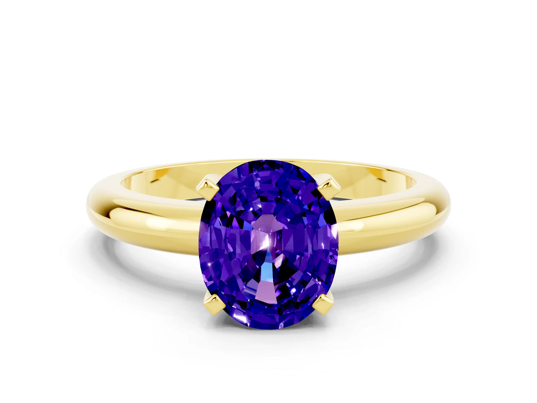 Yellow gold Oval Cut Tanzanite Solitaire Engagement Ring with Round Band and Four-Prong Setting