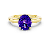 Yellow gold Oval Cut Tanzanite Solitaire Engagement Ring with Round Band and Four-Prong Setting