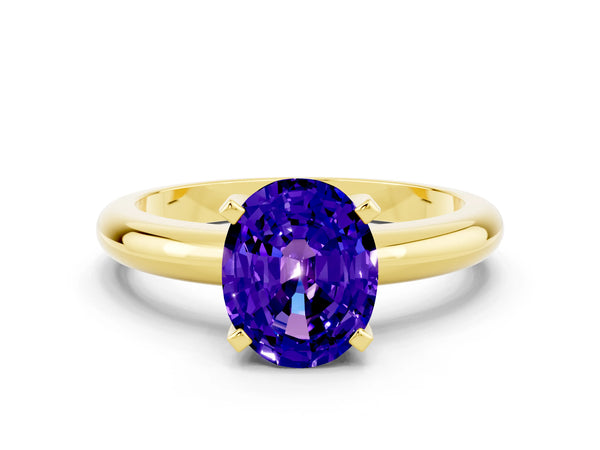 Yellow gold Oval Cut Tanzanite Solitaire Engagement Ring with Round Band and Four-Prong Setting