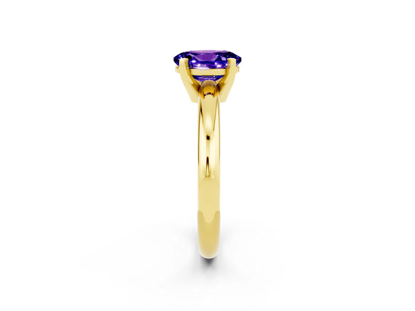 Yellow gold Oval Cut Tanzanite Solitaire Engagement Ring with Round Band and Four-Prong Setting