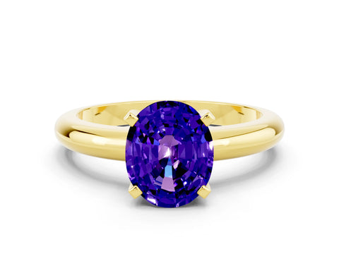 Yellow gold Oval Cut Tanzanite Solitaire Engagement Ring with Round Band and Four-Prong Setting