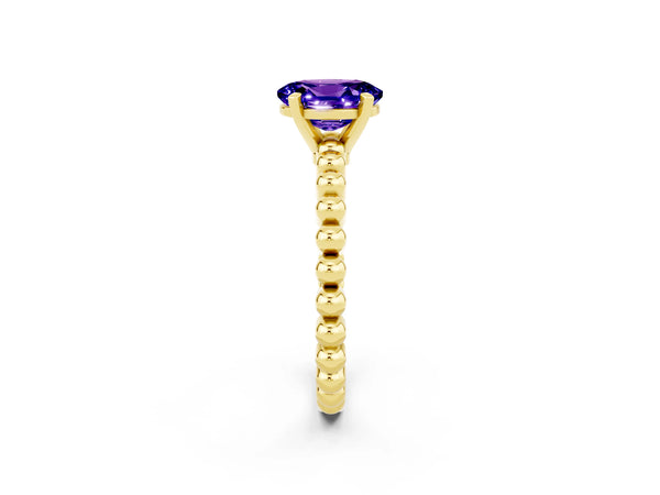 Yellow gold Oval Cut Tanzanite Solitaire Ring with Beaded Band and Prong Setting